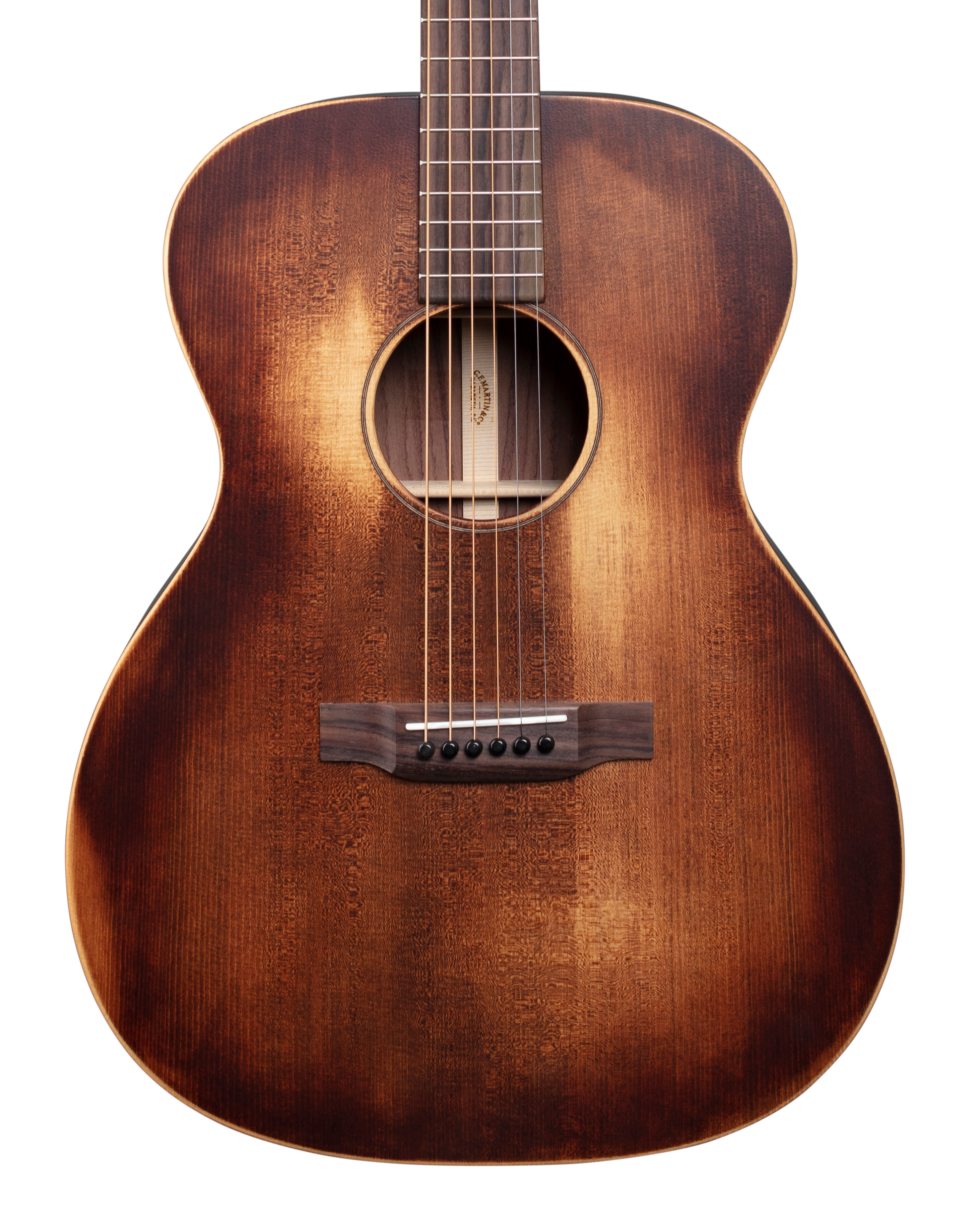 Warm brown acoustic guitar with a rounded body, six strings, circular sound hole, and visible wood grain patterns across the front.