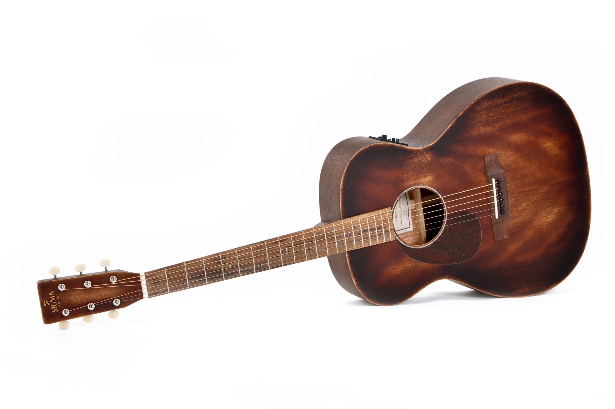 Dark brown acoustic guitar with a matte finish, six strings, rounded body, and white tuning pegs on the headstock.