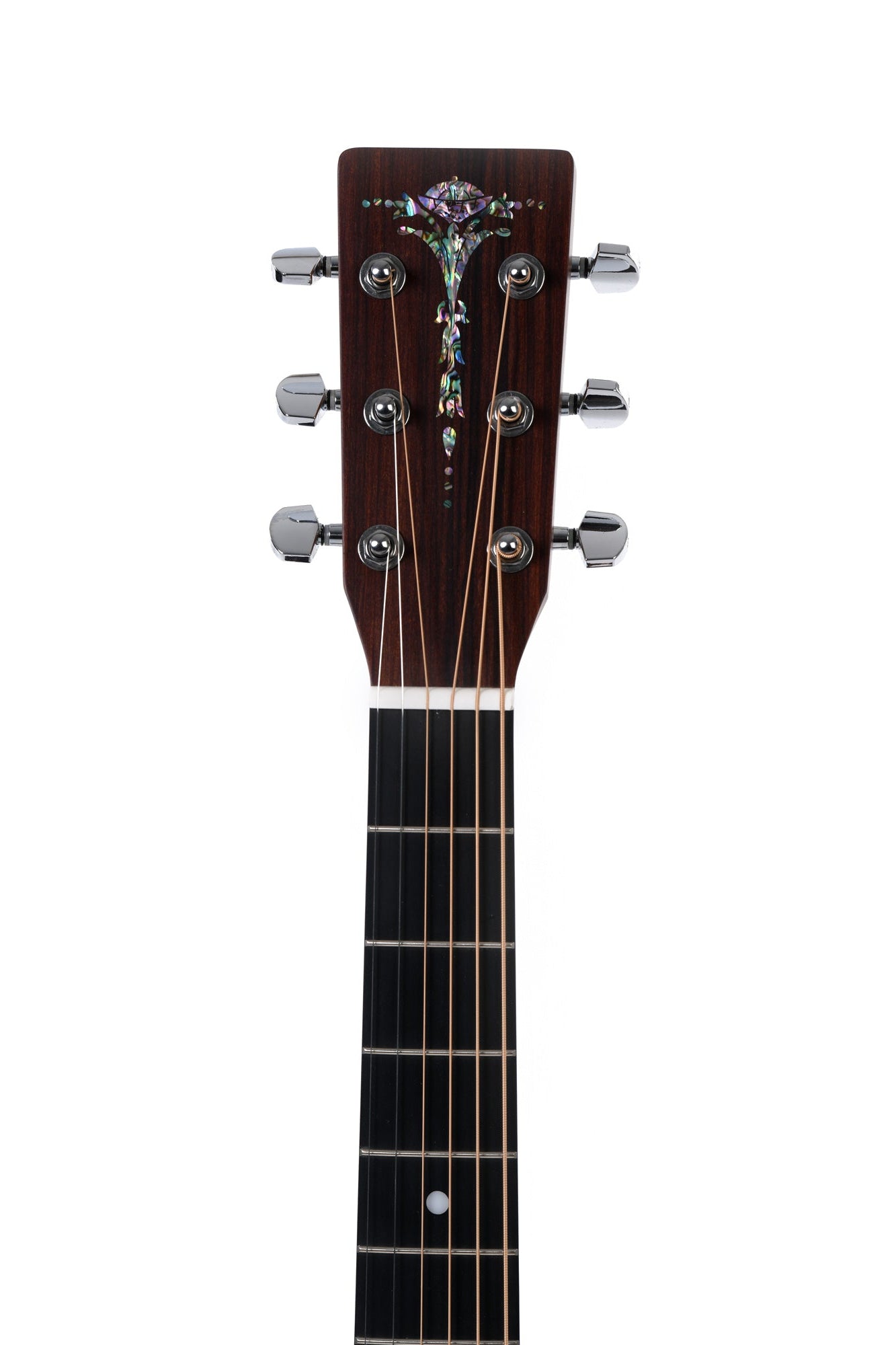 Acoustic guitar headstock with six metal tuning pegs and a floral inlay design above the nut, dark wood finish, six steel strings visible.
