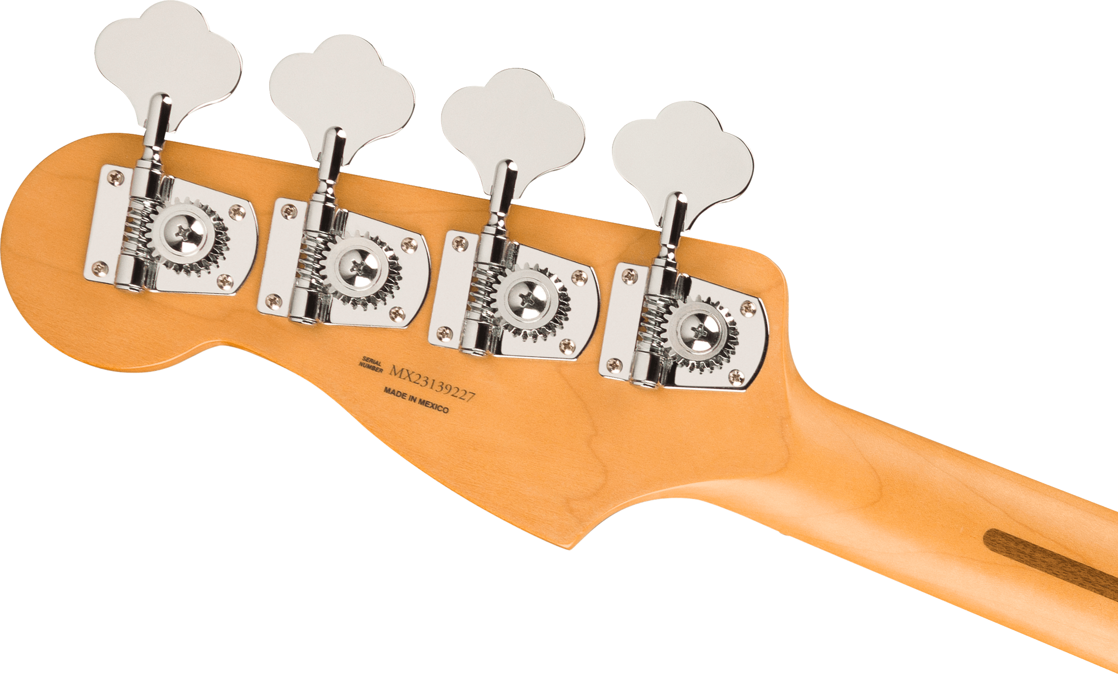 Four large chrome tuning pegs attached to the light wood headstock and neck of an electric bass, with "Made in Mexico" stamped on the back.