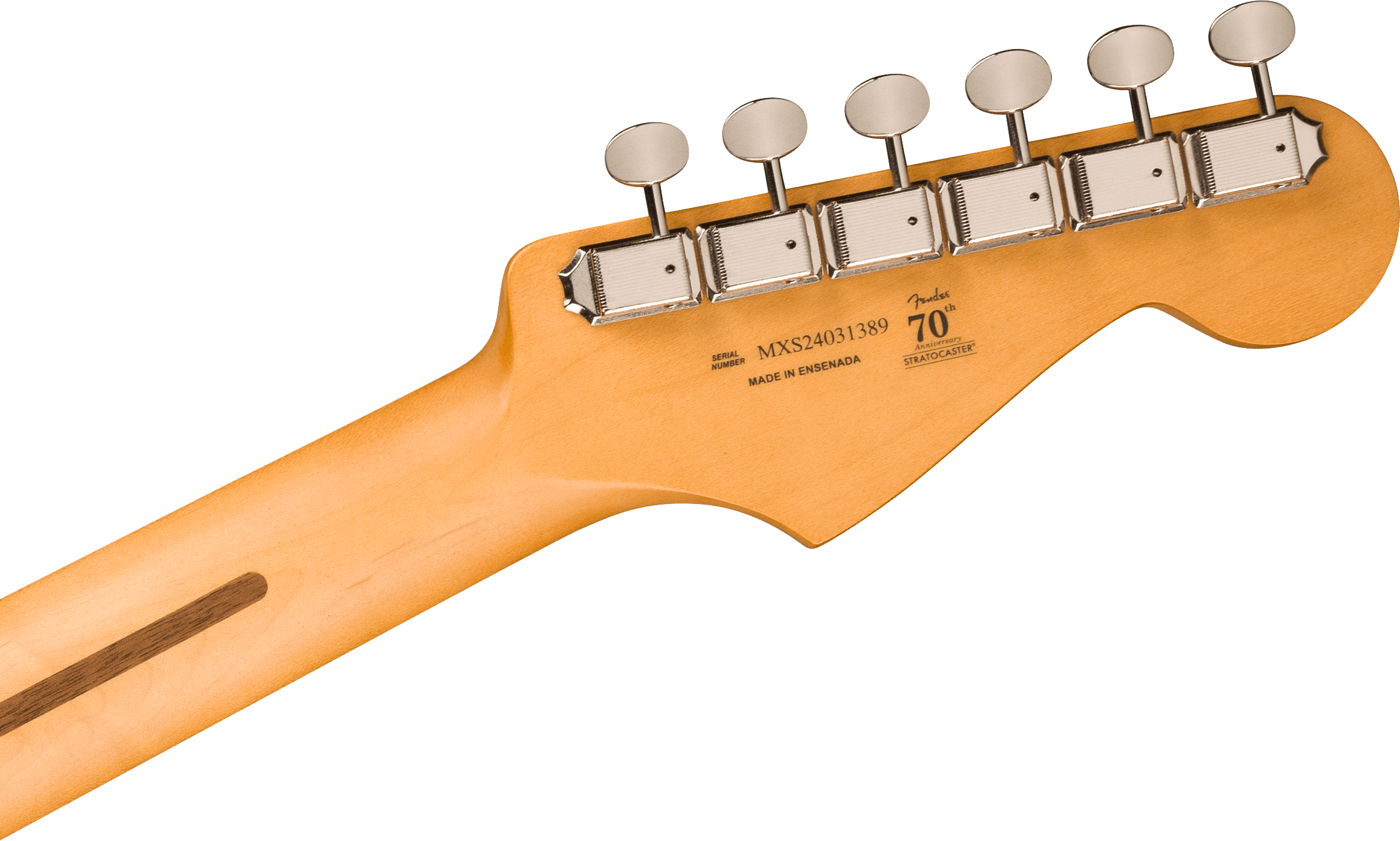 Back of a Fender electric guitar headstock showing six chrome tuners and text marking the 70th Anniversary Stratocaster, made in Ensenada.