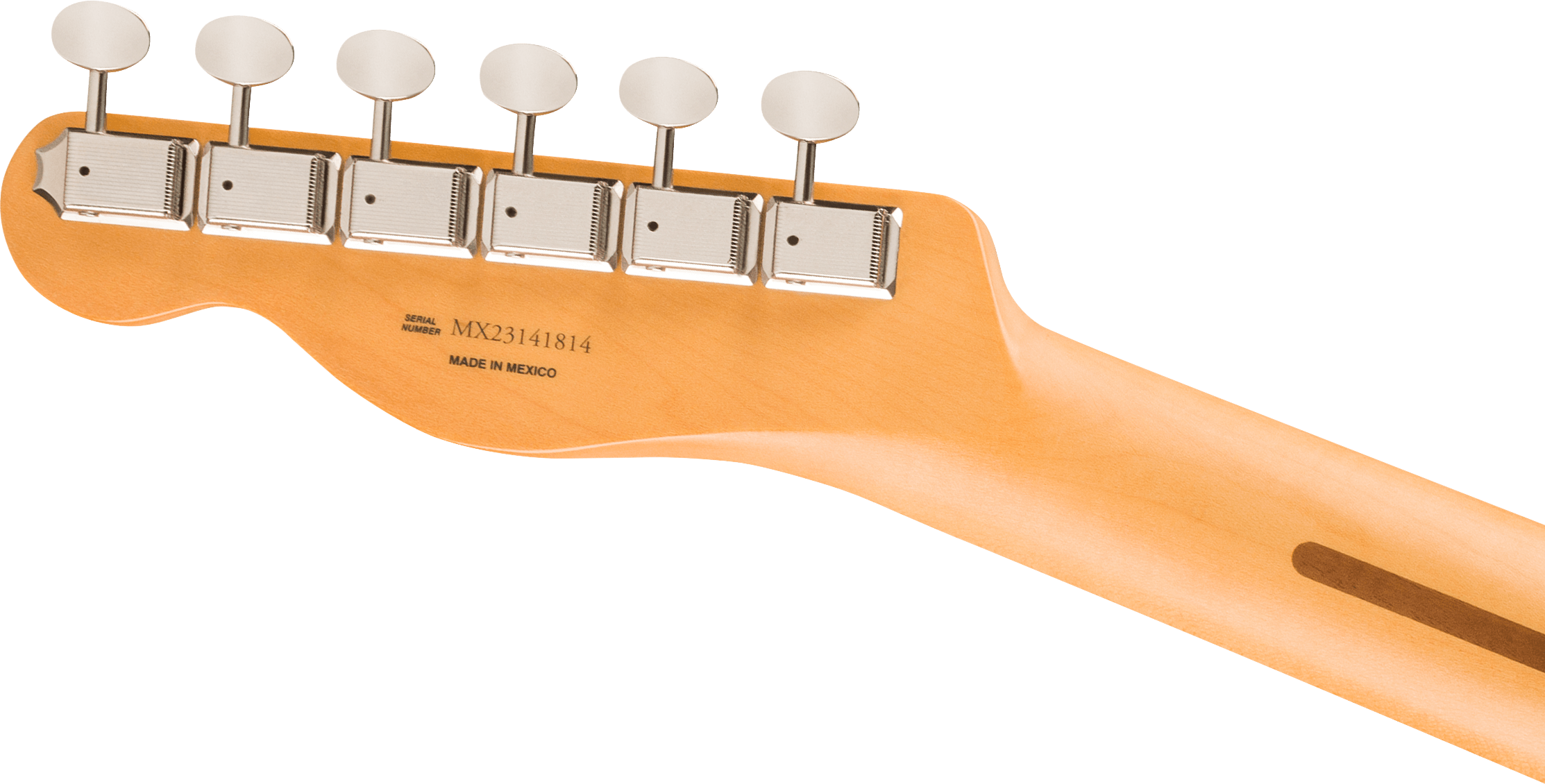 Back of an electric guitar headstock showing six silver tuning pegs and “Made in Mexico” text engraved on the light wood.