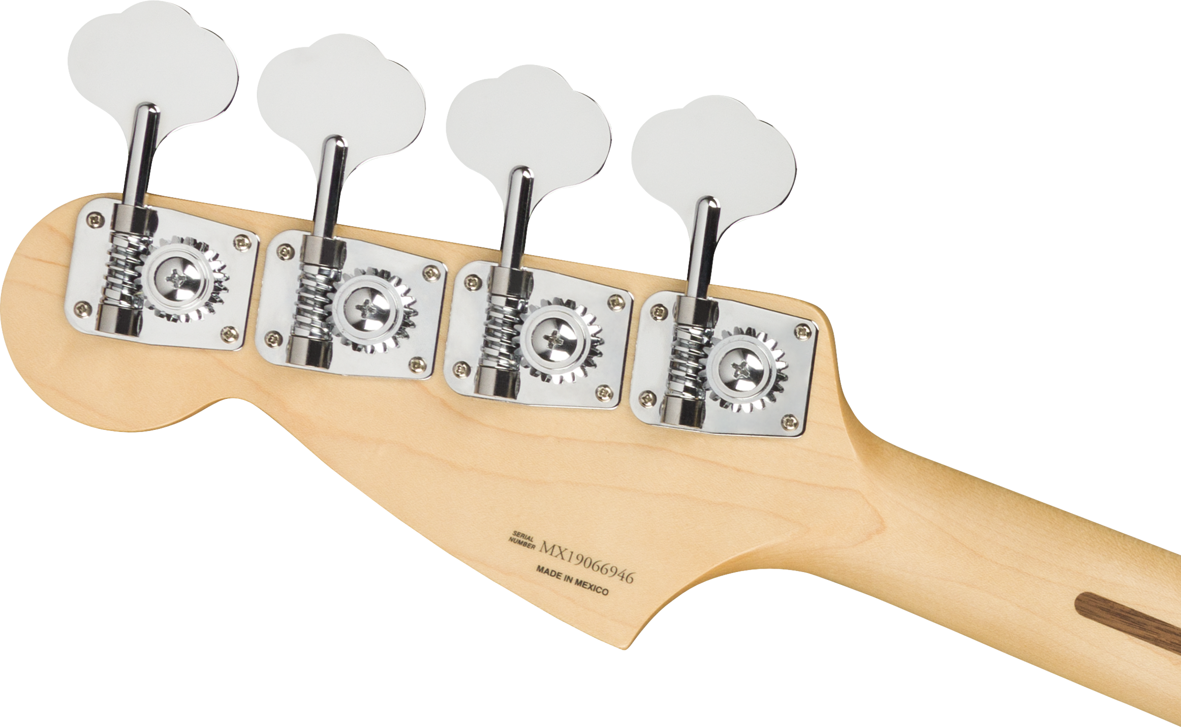 Light wood bass guitar headstock with four large metal tuning pegs and engraved “Made in Mexico” with a visible serial number.