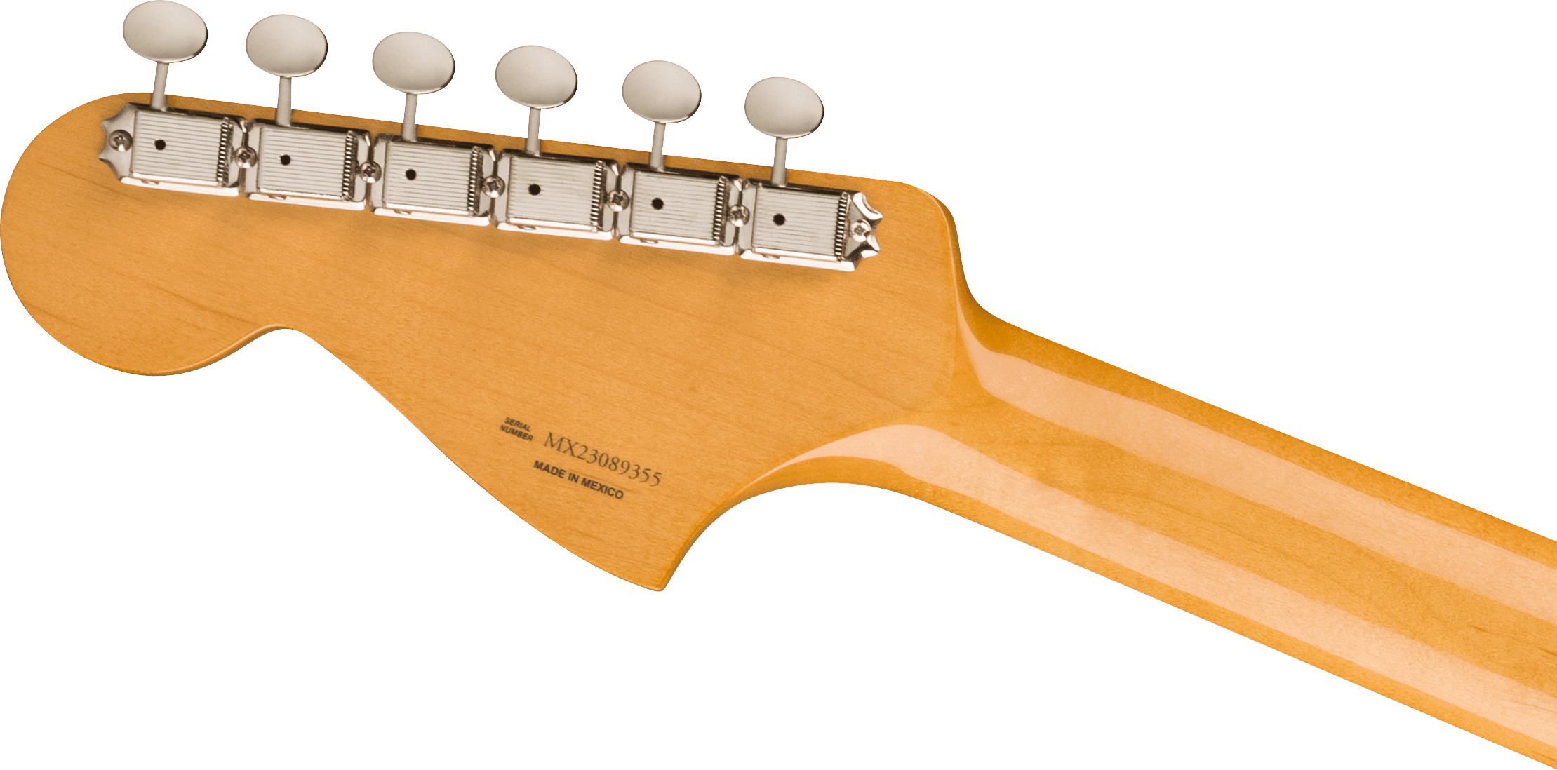 Back of a bass guitar headstock, light wood finish, five metal tuning pegs, serial number and "Made in Mexico" text visible on the neck.