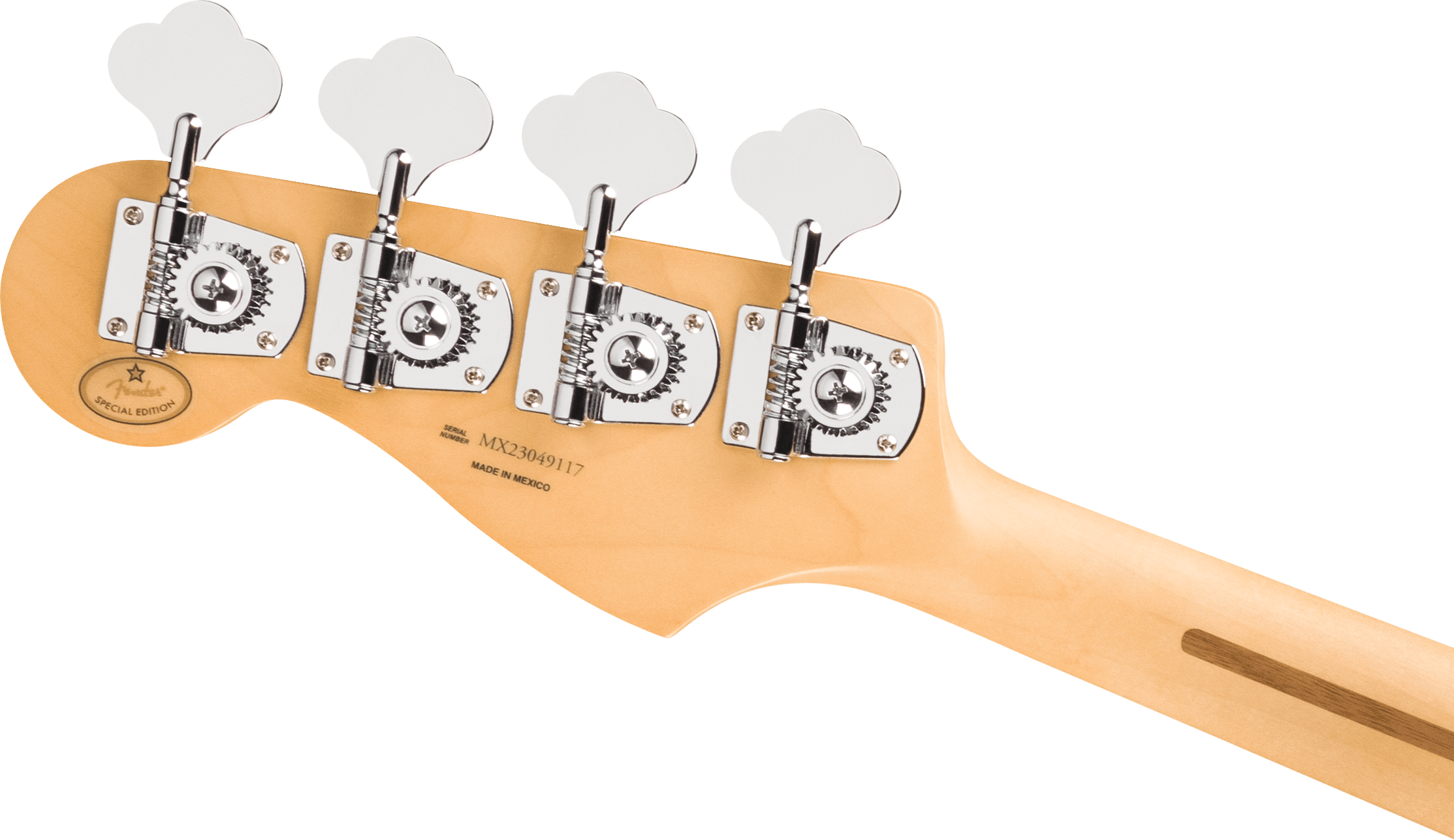 Four large chrome tuning pegs on a light wood bass guitar headstock, marked "Special Edition" and "Made in Mexico" with a visible serial number.