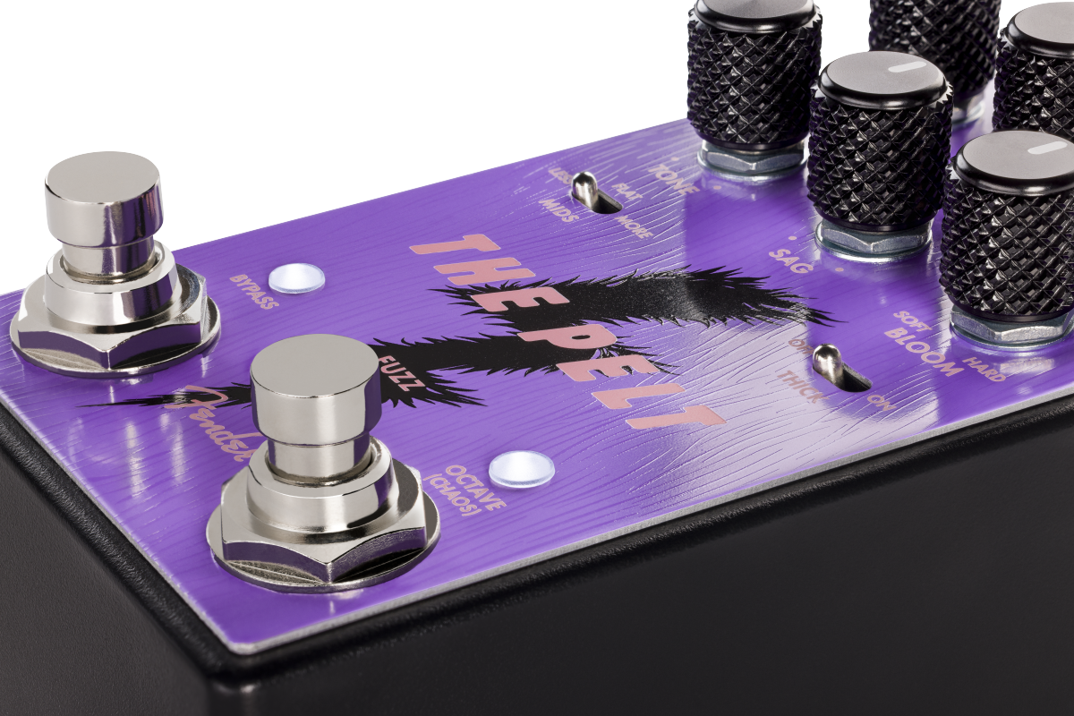 Purple FX pedal called "The Pelt" with two footswitches, five black control knobs, toggle switches, and white indicator lights.