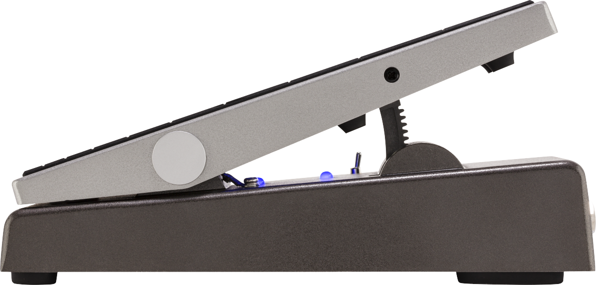 Side view of a guitar FX pedal with a metallic foot treadle angled upward and a large round silver knob on the side.