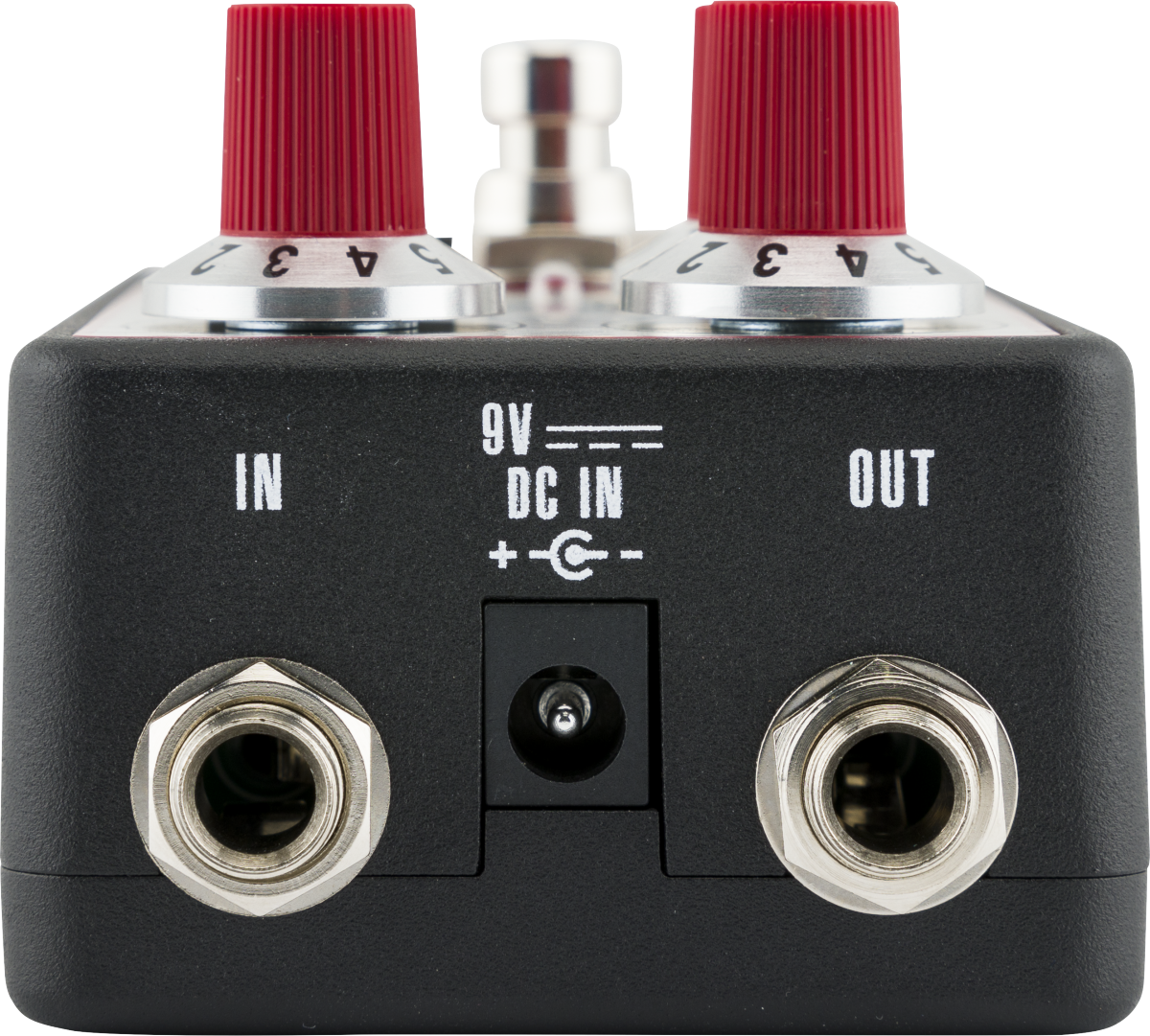 Guitar FX pedal with two red knobs on top, 9V DC input at center, and quarter-inch input and output jacks labeled IN and OUT on the sides.