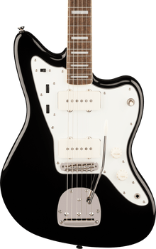 Guitare électrique noire à six cordes avec plaque blanche, deux micros rectangulaires blancs, boutons volume et tonalité, et vibrato chromé.
