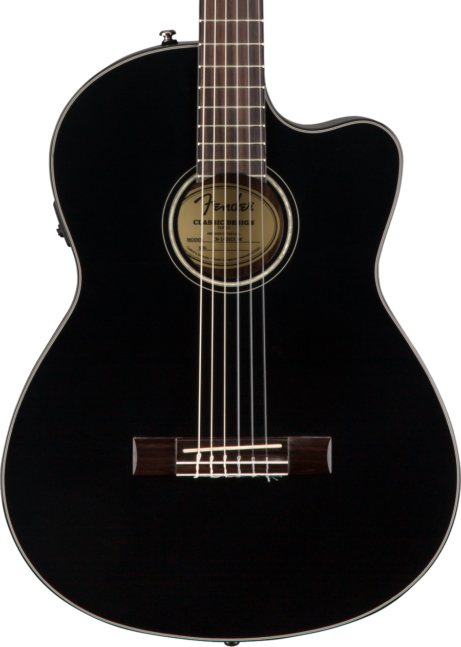 Glossy black classical guitar with nylon strings, a cutaway body, and a round soundhole featuring a visible label inside.