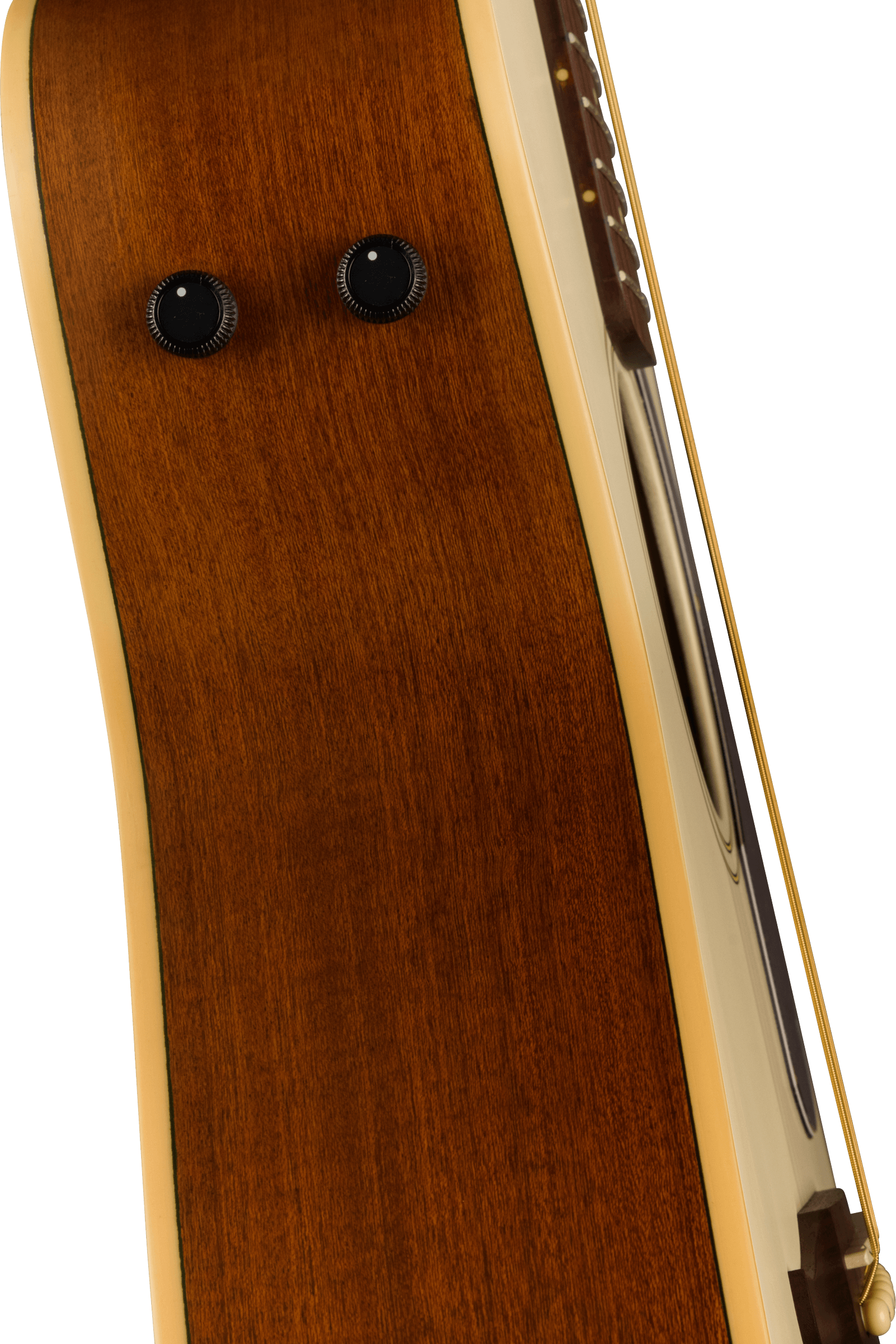 Side view of an acoustic guitar showing two black control knobs on a brown wooden body with cream binding.