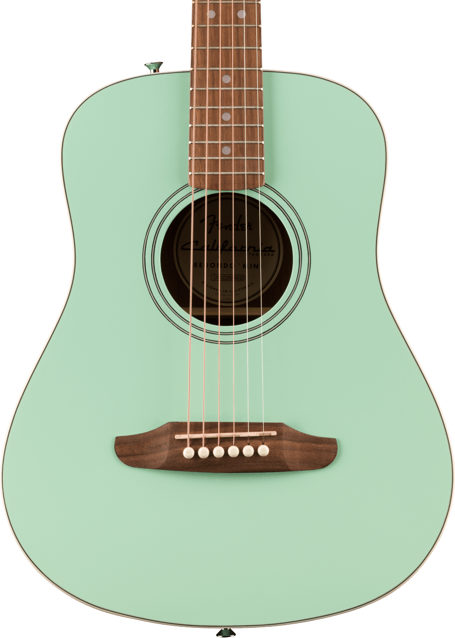A seafoam green Fender acoustic guitar with a round sound hole, wooden bridge, white pin pegs, and six steel strings.