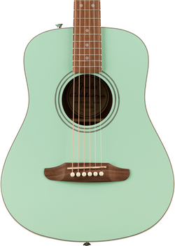 A seafoam green Fender acoustic guitar with a round sound hole, wooden bridge, white pin pegs, and six steel strings.