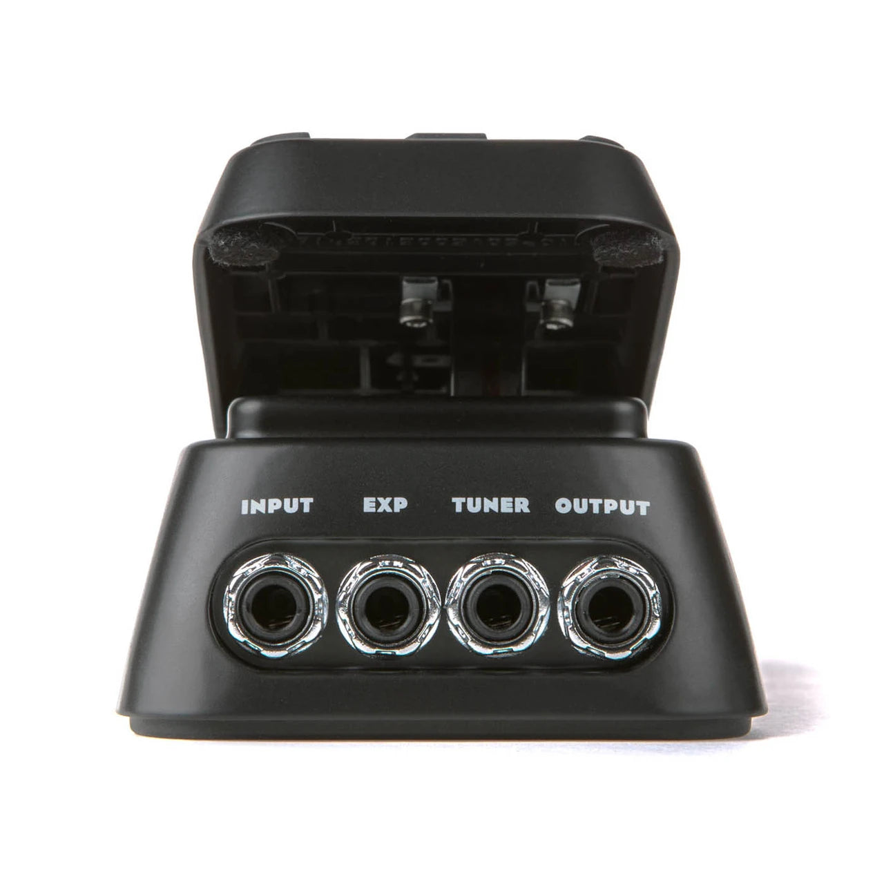 Pédale d’effets noire, vue arrière, quatre prises jack alignées nommées Input, Exp, Tuner et Output, capot relevé.