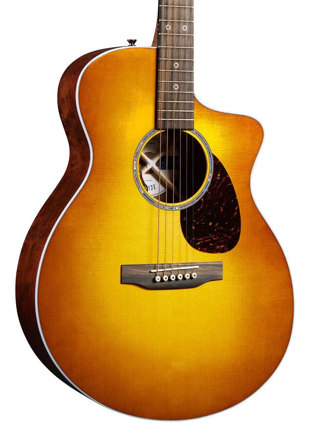 Sunburst acoustic guitar with a cutaway body, six strings, dark brown pickguard, white binding, and circular sound hole.