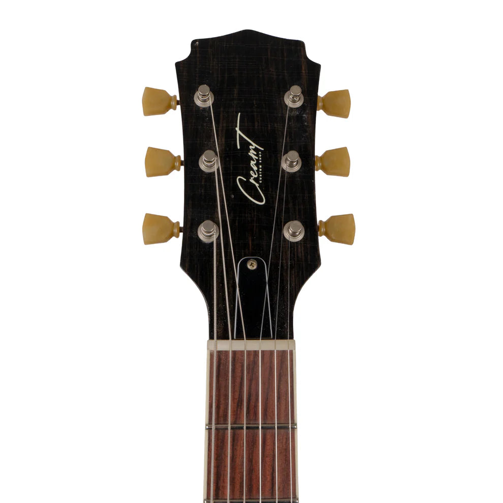 Electric guitar headstock with six tuning pegs, dark wood finish, cream-colored knobs, and "Cream T" logo in white script on the front.