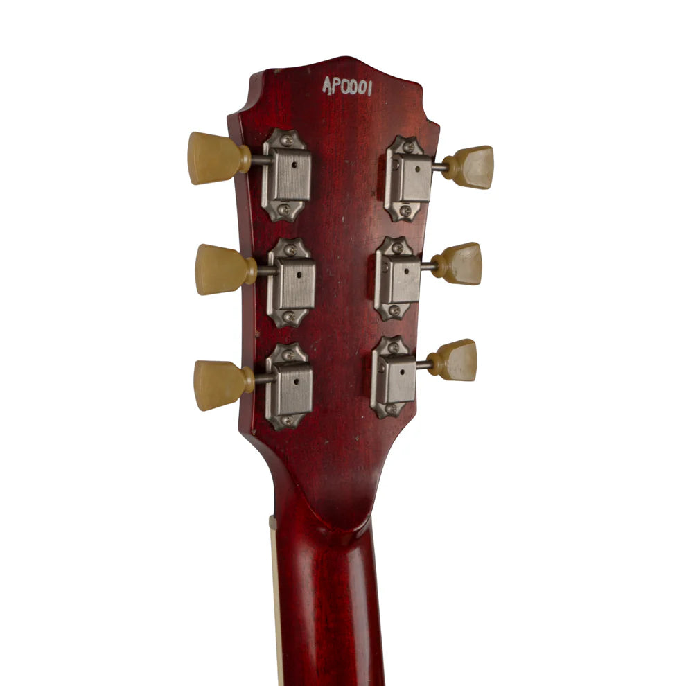 Back of a red electric guitar headstock with six vintage-style metal tuners and cream tuning pegs; serial number AP0001 at the top.