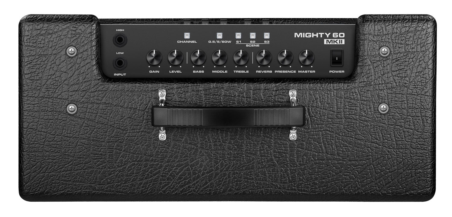 Black Mighty 60 MKII amplifier top panel with two input jacks, eight control knobs, scene buttons, power switch, and a central carrying handle.