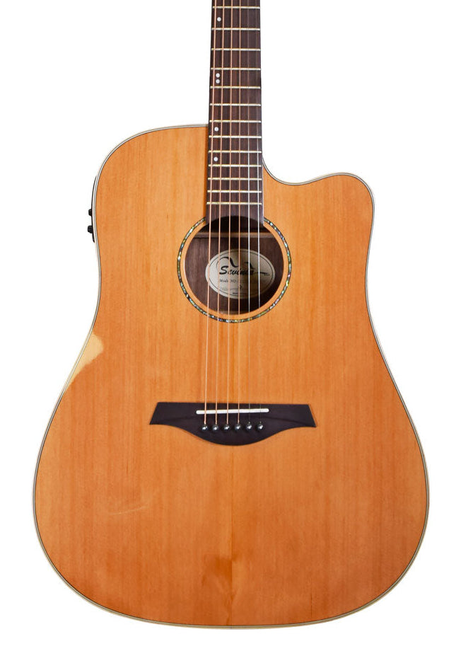 Natural wood finish acoustic guitar with a single cutaway, six strings, and a black bridge.