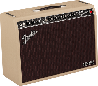 Beige Fender guitar amplifier with brown grille, top control panel has knobs and input jacks, handle on top, labeled Deluxe Reverb Amp and Tone Master.