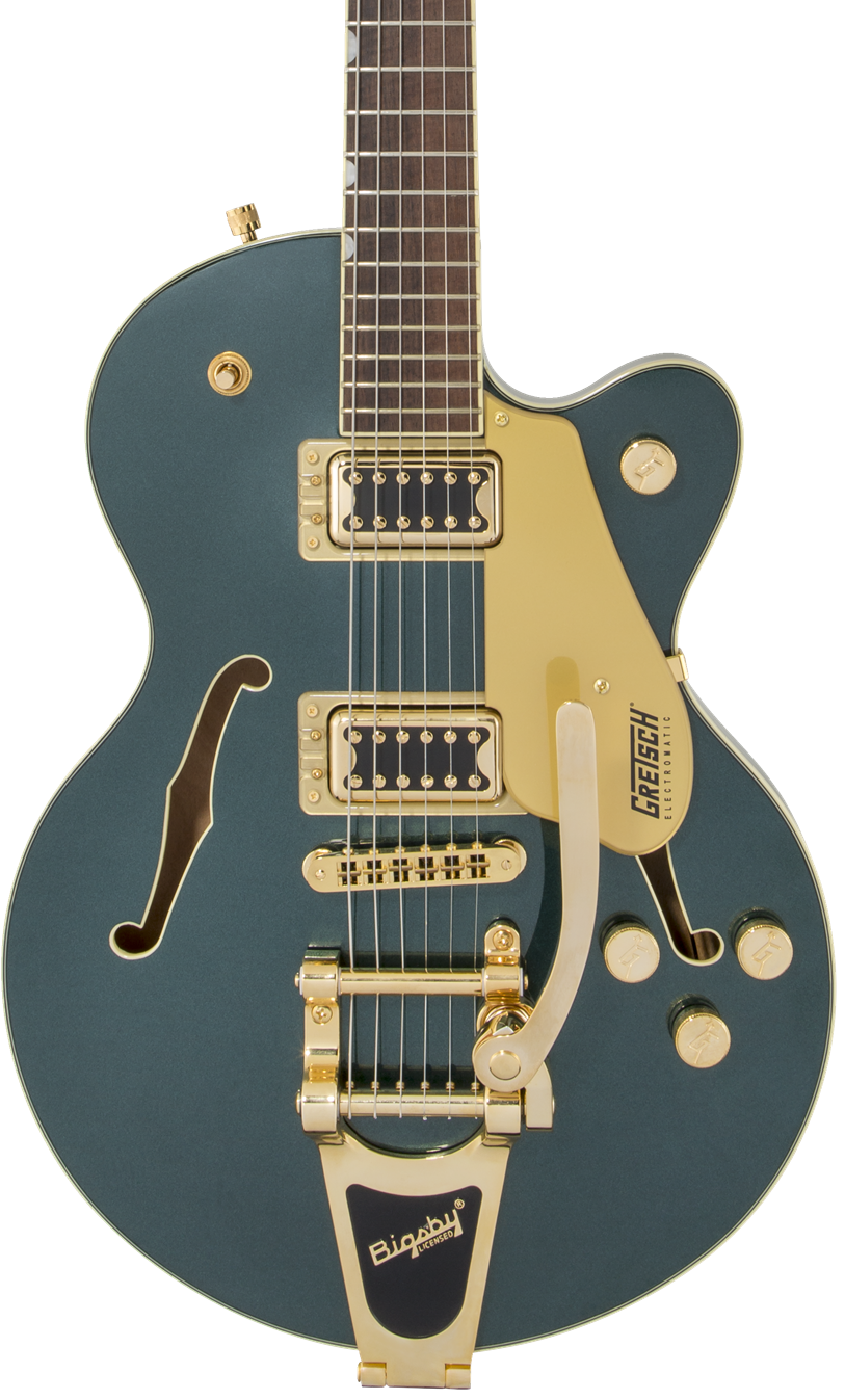 Metallic green electric guitar with gold hardware, two pickups, a Bigsby-style tremolo, and f-shaped sound holes on the body.