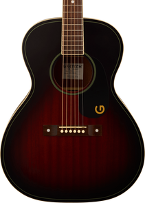 Small-bodied acoustic guitar with a dark sunburst finish, cream binding, six steel strings, and a black pickguard featuring a gold 