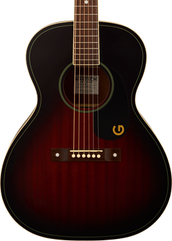 Small-bodied acoustic guitar with a dark sunburst finish, cream binding, six steel strings, and a black pickguard featuring a gold 