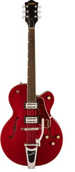 Red Gretsch electric guitar with a semi-hollow body, two humbucker pickups, Bigsby vibrato tailpiece, and gold control knobs.