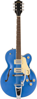 Gretsch electric guitar in metallic blue with f-holes, two silver humbucker pickups, cream pickguard, and a Bigsby tremolo bridge.