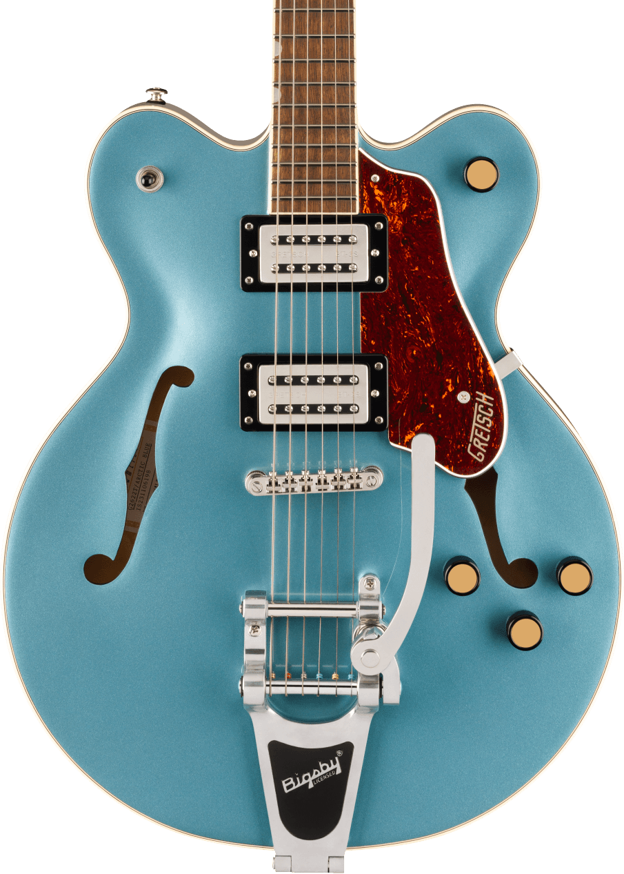 Metallic blue hollow-body electric guitar with two pickups, Bigsby tremolo, gold control knobs, and a red tortoiseshell pickguard marked Gretsch.
