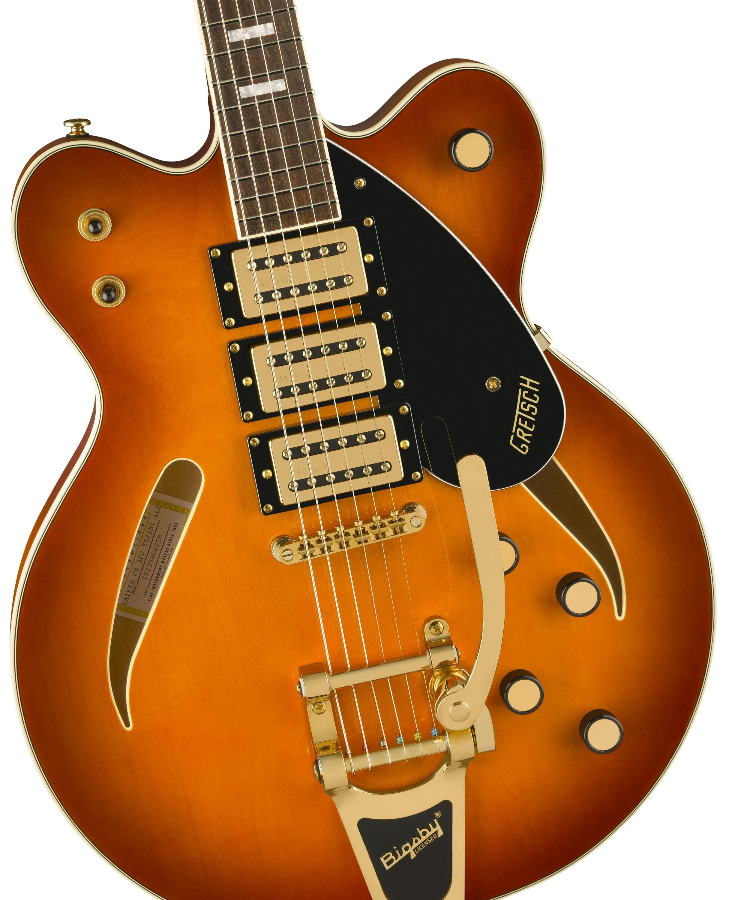 Sunburst finish electric guitar with gold hardware, three gold pickups, black pickguard labeled Gretsch, and a gold Bigsby tremolo arm.