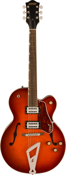 Gretsch hollow body electric guitar with an orange sunburst finish, f-holes, two humbucker pickups, gold knobs, and a distinctive “G” tailpiece.