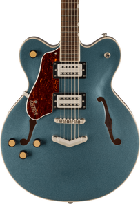 Blue semi-hollow electric guitar with two pickups, four gold knobs, f-shaped sound holes, and a brown pickguard labeled Gretsch.