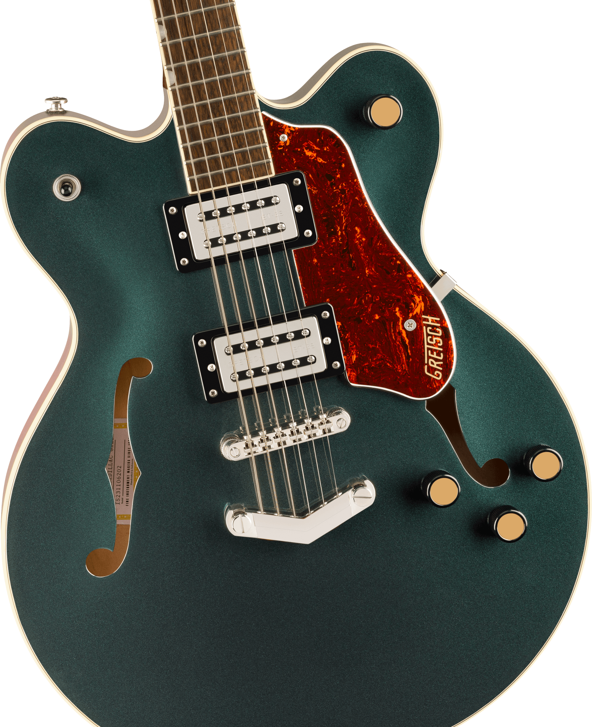Dark green semi-hollow electric guitar with gold knobs, two chrome pickups, tortoiseshell pickguard, and f-shaped sound holes on the body.