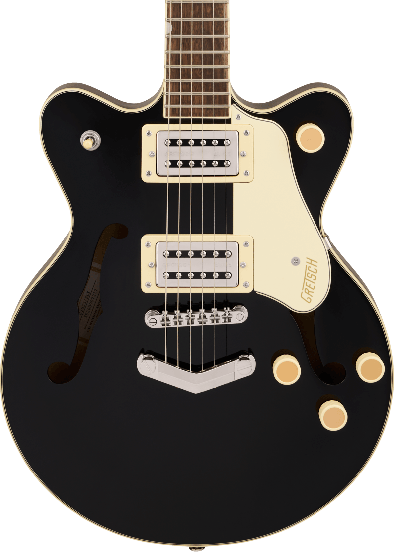 Black electric guitar with two chrome pickups, four cream knobs, F-shaped sound holes, and a cream pickguard labeled Gretsch.