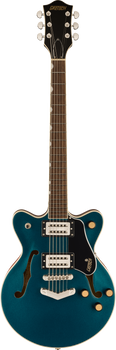 Gretsch electric guitar in metallic teal with semi-hollow body, two humbucker pickups, black pickguard, and gold control knobs.