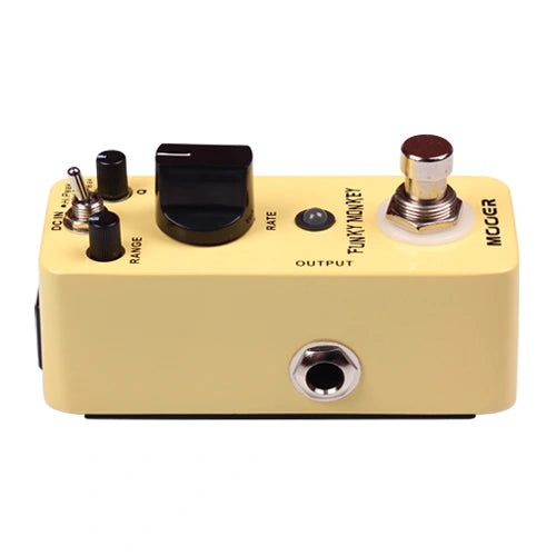 Yellow Mooer Funky Monkey effects pedal with black knob, small switch, metal footswitch, and input/output jacks on the sides.