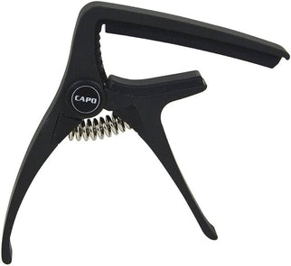 Black guitar capo with a spring-loaded clamp design and the word 