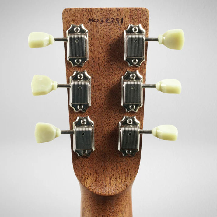 Back of an electric guitar headstock showing six metal tuning machines with cream-colored knobs and a handwritten serial number "#032381" at the top.