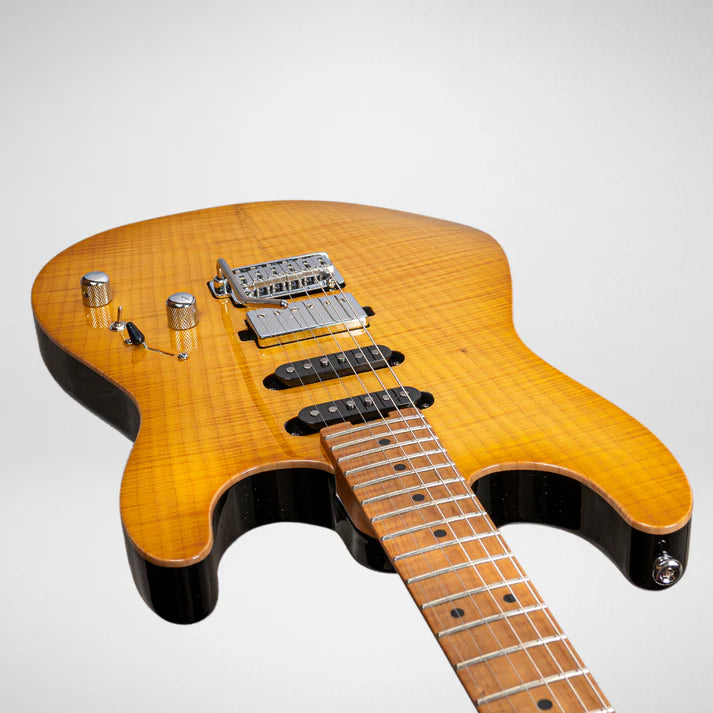 Electric guitar with a glossy, amber-colored wood grain top, three pickups, two metal knobs, a switch, and a whammy bar bridge.
