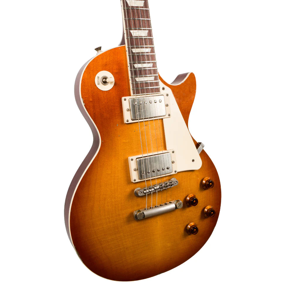 Sunburst electric guitar with two chrome humbucker pickups, four amber control knobs, and a cream pickguard.
