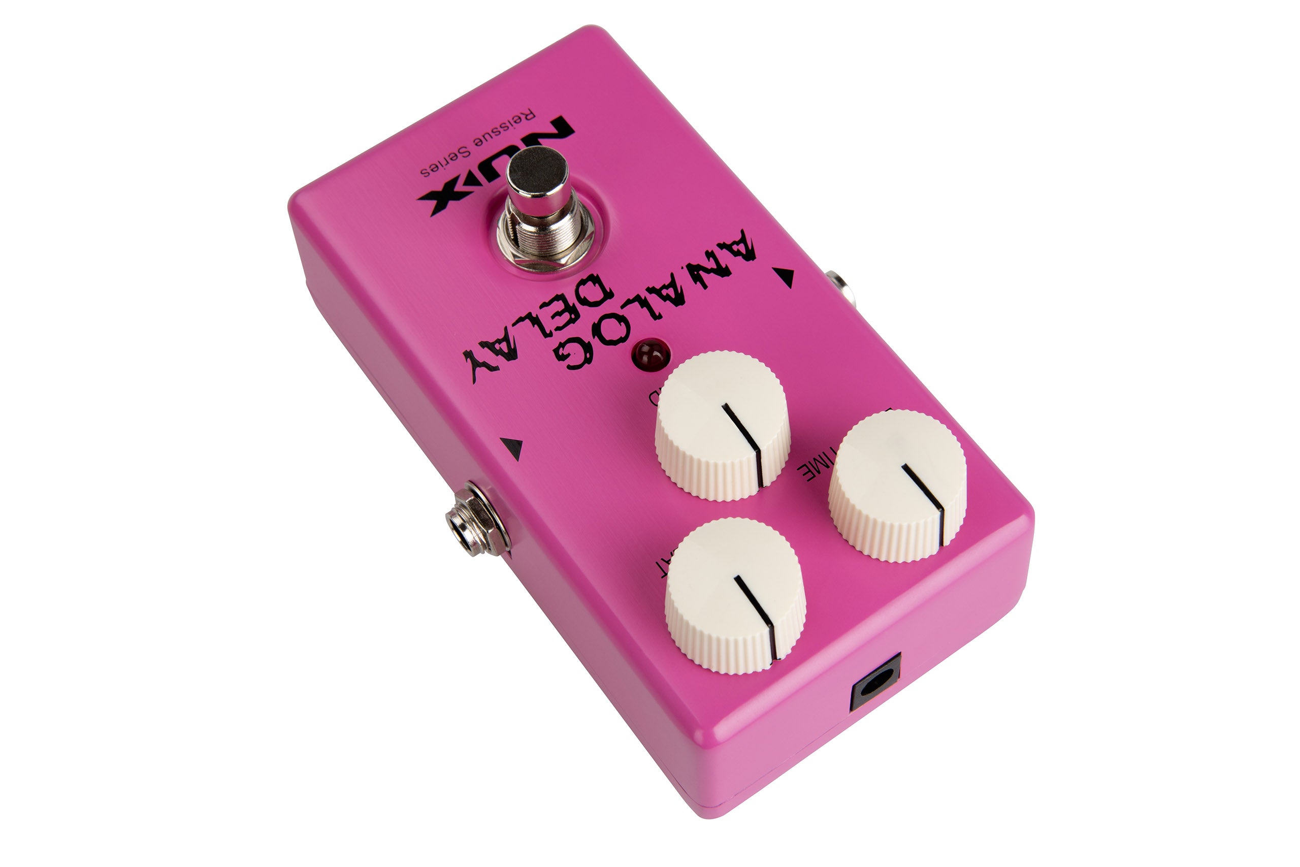 Bright pink FX pedal labeled "Analog Delay" with three white knobs, a metal footswitch, input jacks, and a small LED indicator on top.