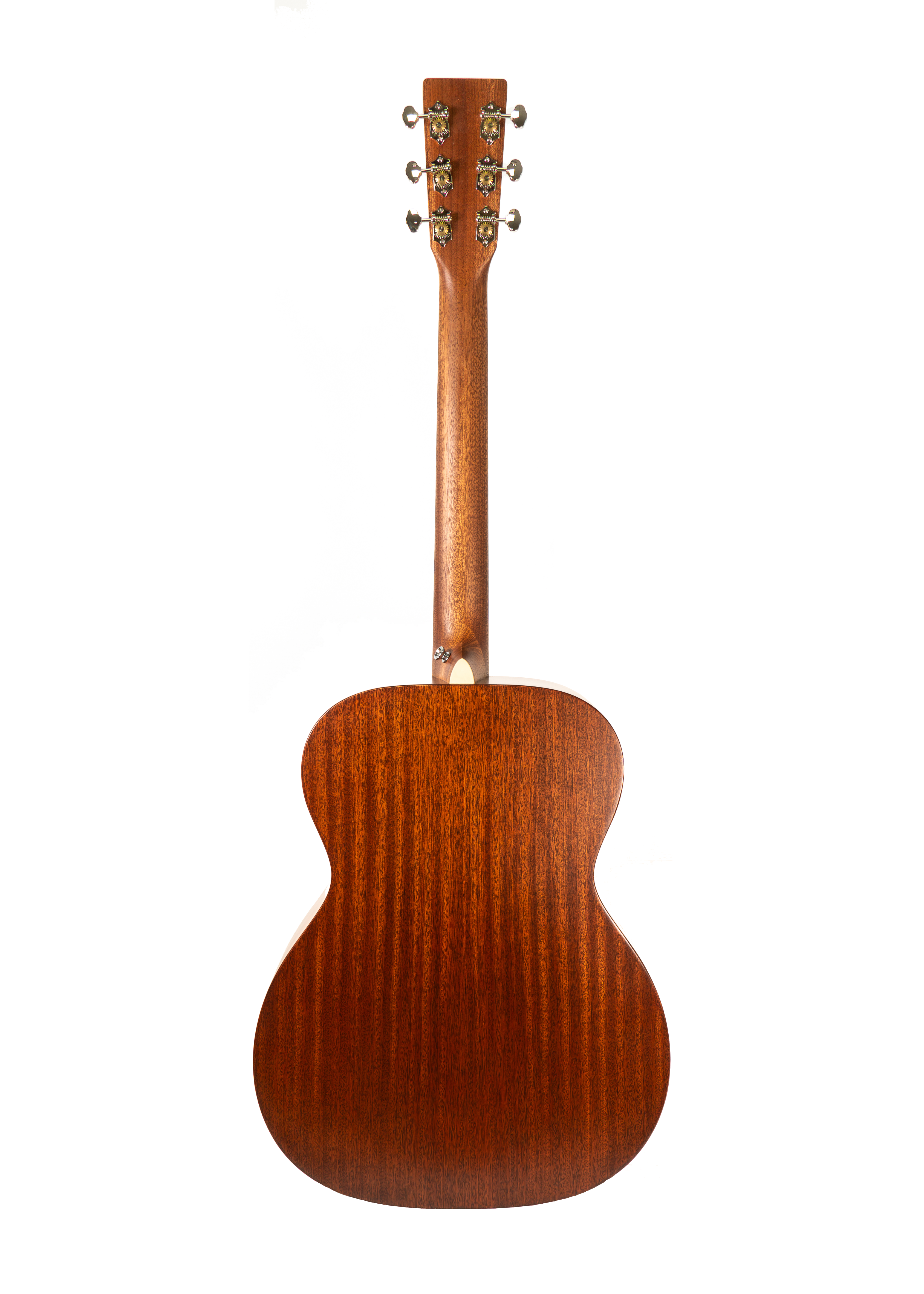 Mahogany acoustic guitar shown from the back, highlighting smooth wood grain, six tuning pegs, and a classic curved body shape.
