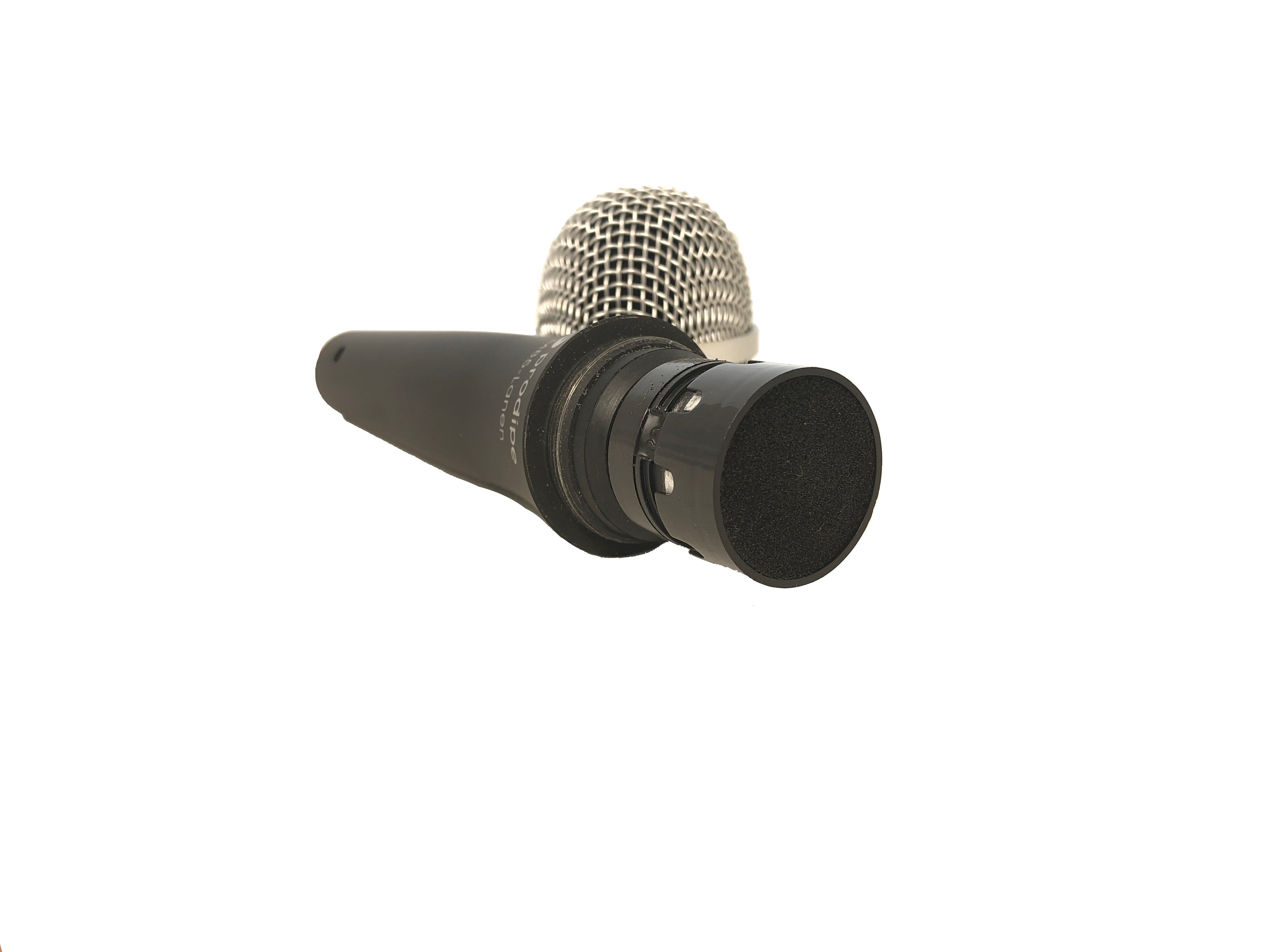 Disassembled black handheld microphone with the silver mesh head removed, exposing the inner foam and components for recording.