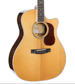 Acoustic guitar with a natural wood finish, dark pickguard, cutaway body, and visible sound hole rosette detail.