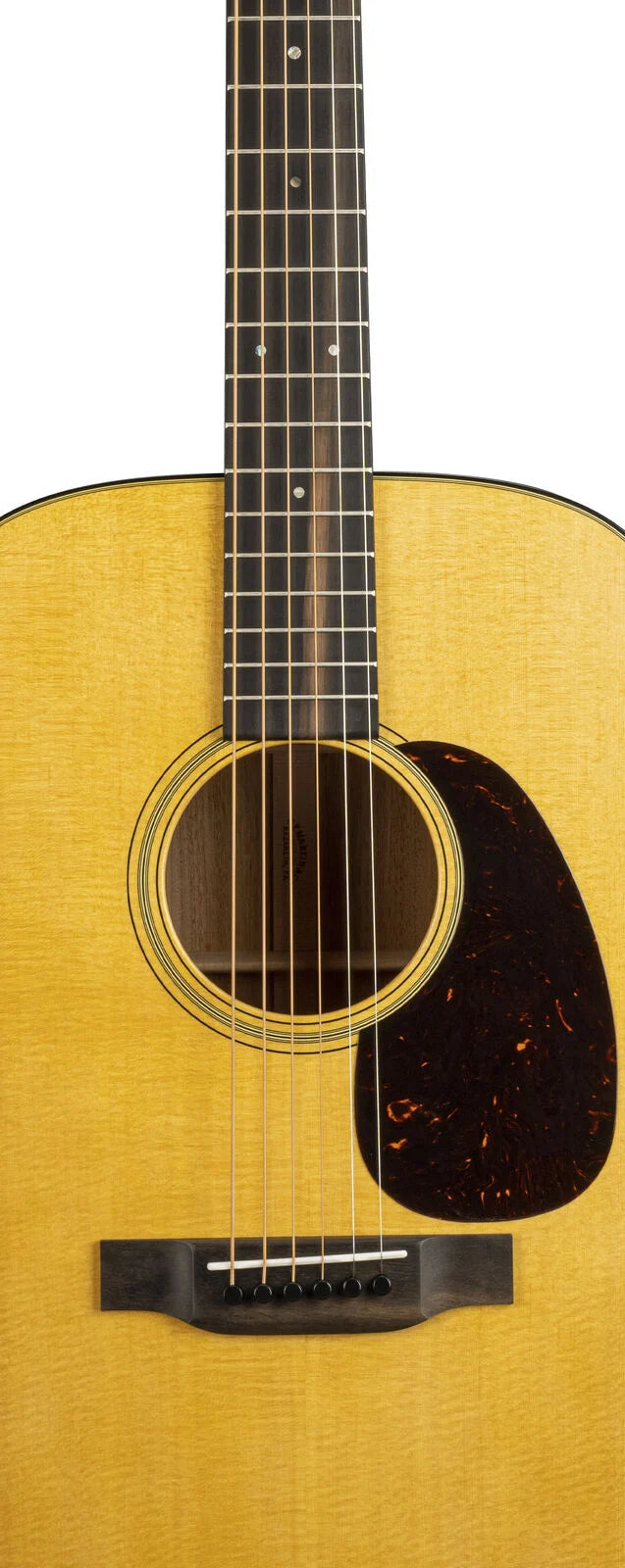 Acoustic guitar with a natural wood finish, dark pickguard, six strings, and pearl fretboard markers shown from body to mid-neck.