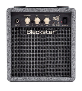 Blackstar amplifier with a textured gray border, black grille, four control knobs on top, labeled input, volume, EQ, delay, and power button.