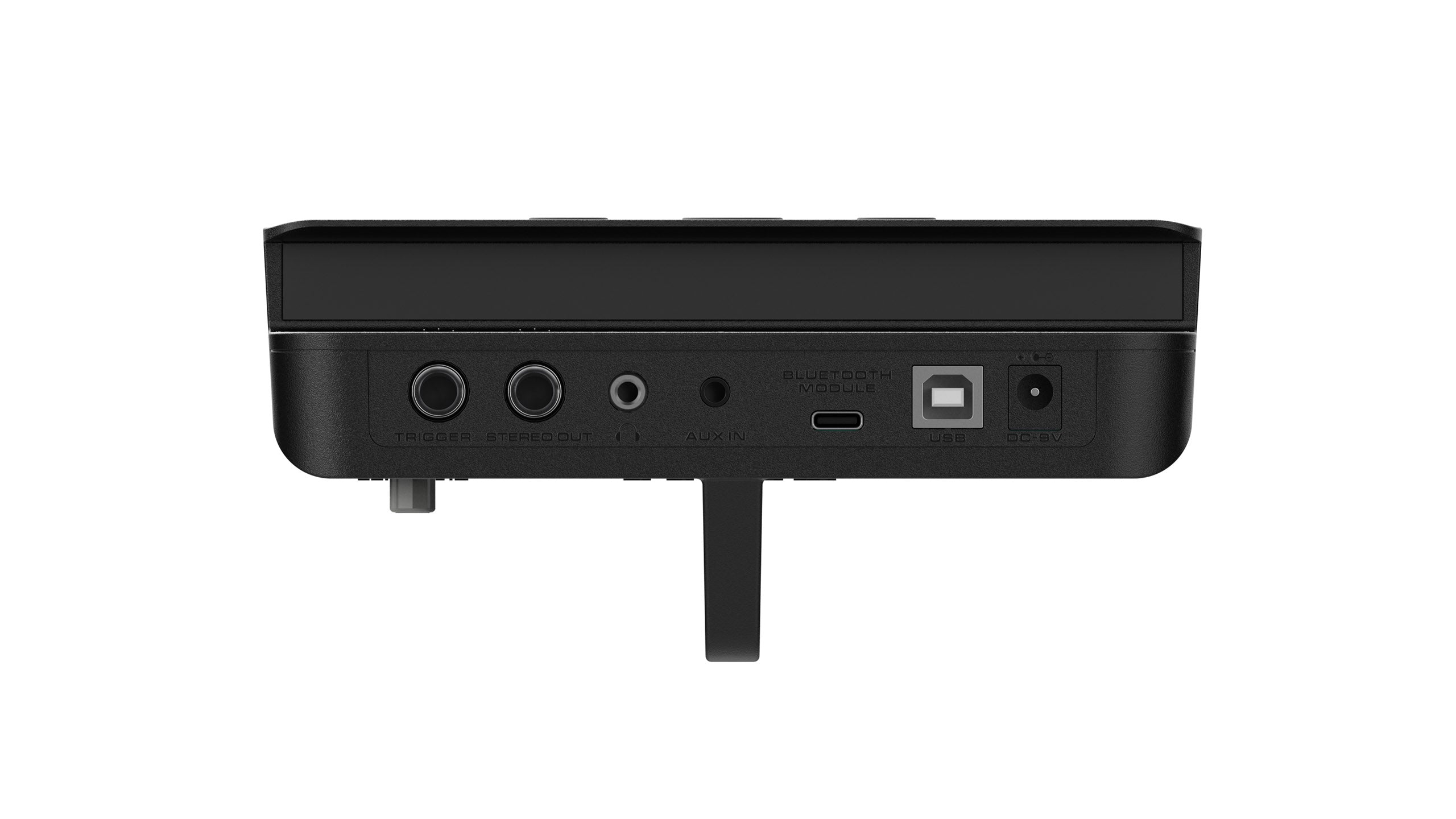 Rear view of an electronic drums module showing ports for triggers, stereo out, aux in, Bluetooth, USB, and a DC 9V power input.