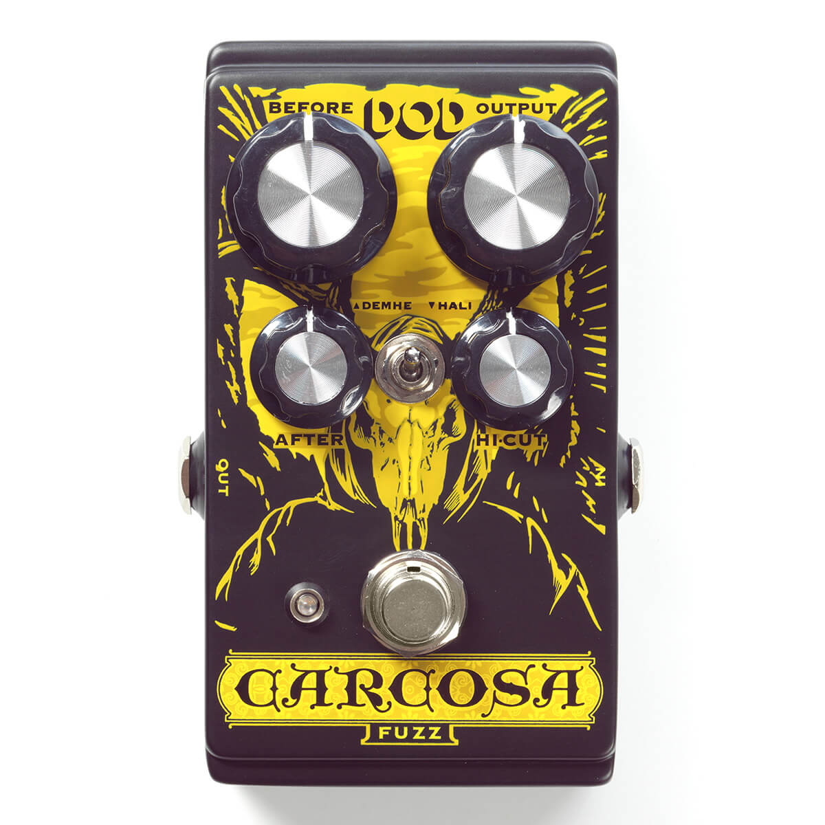 DOD Carcosa Fuzz effects pedal, with four control knobs and a yellow skull graphic on a black background.