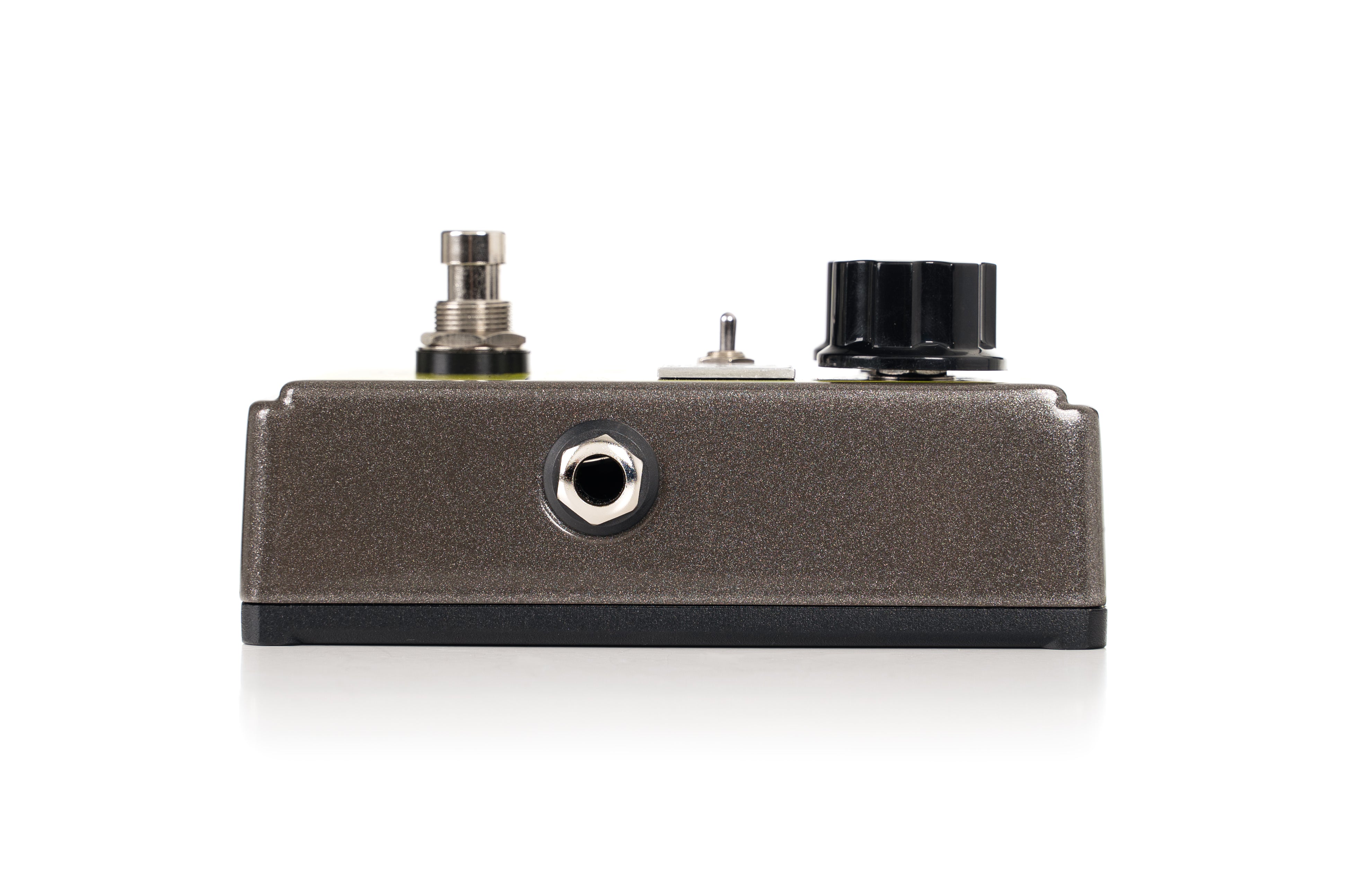 Metallic FX pedal with a large black knob, small toggle switch, footswitch, and a single input jack on the front panel.